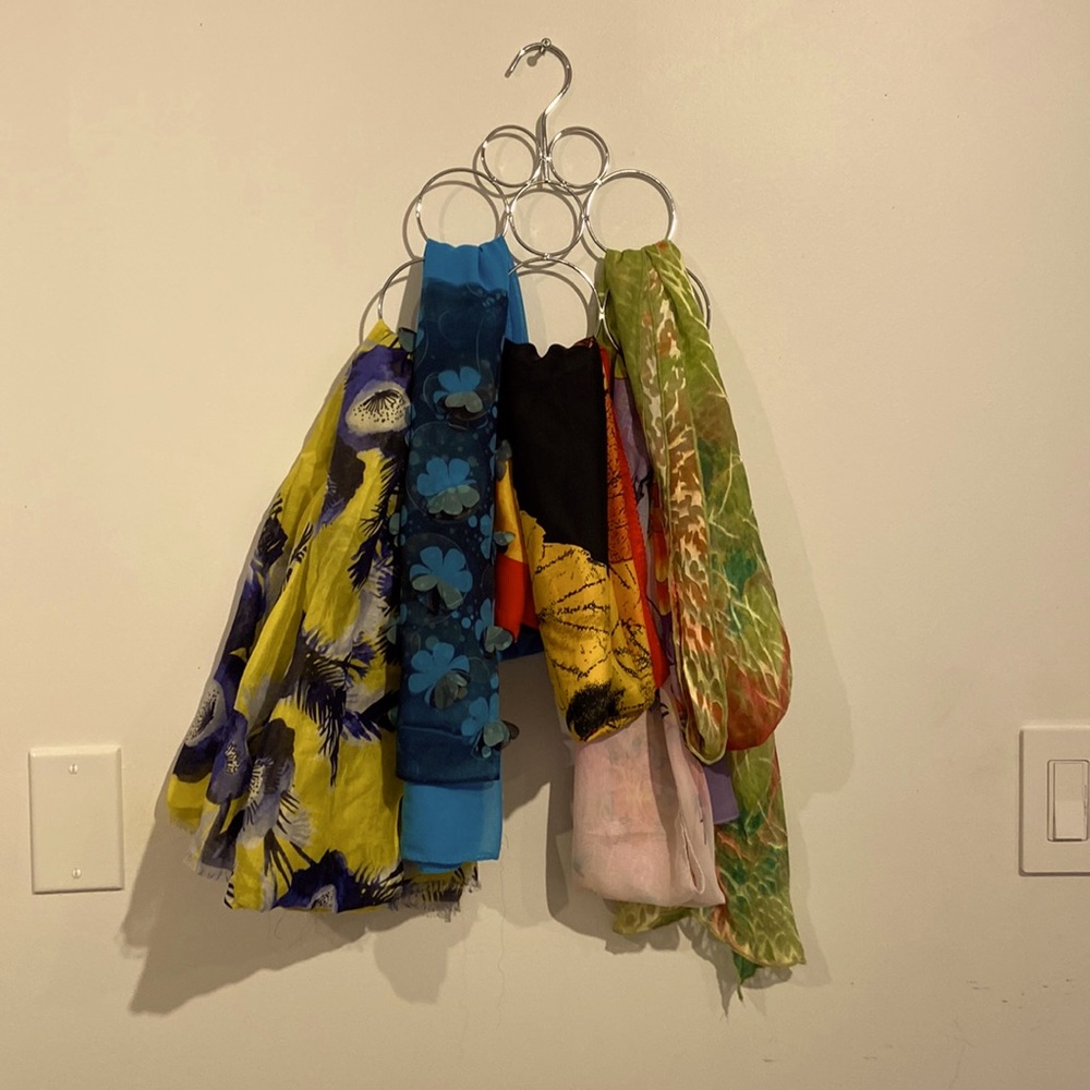 Multiple ladies scarves for sale, prices range from $5.00 to 15.00 each